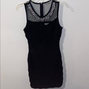 Black fitting dress with rhinestones